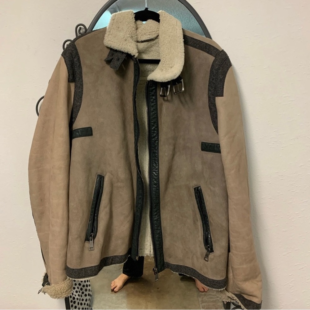 Dolce & Gabbana shearling coat with high collar.